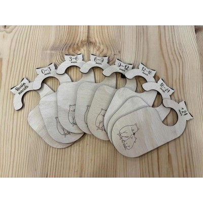 perchas de madera meses bebé